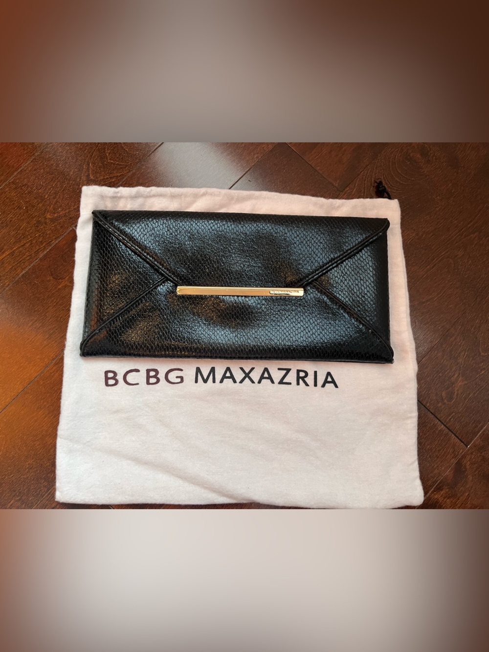 BCBGMaxAzria Black Envelope Clutch with Gold Bar